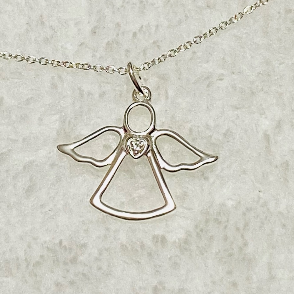 Avon Sterling Silver CZ Angel Necklace
